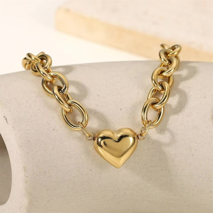 Gold Bracelet with Heart Charm
