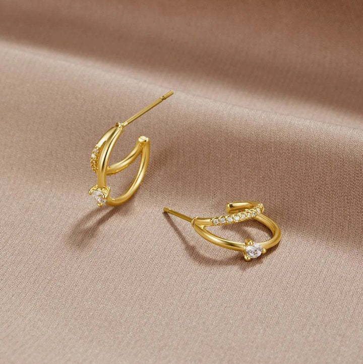 Diamond touch gold earrings